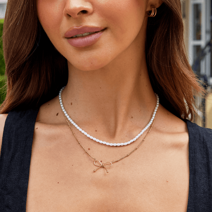 Anika Gold Bow Necklace